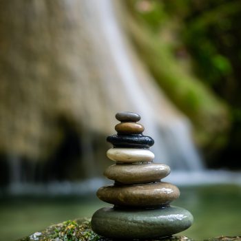 Balanced Zen stones at the waterfalls