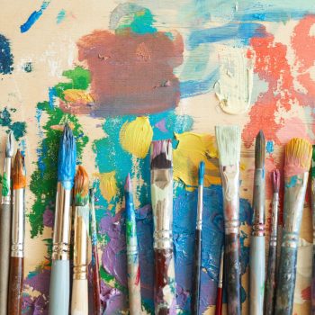 Paintbrushes in paints